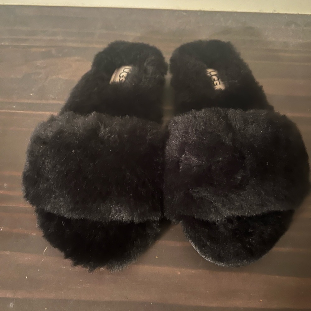 Never worn black Ugg slippers